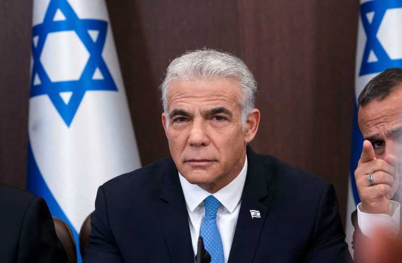  Israel's Prime Minister Yair Lapid attends the weekly cabinet meeting in Jerusalem, August 14, 2022. (photo credit: MAYA ALLERUZZO/REUTERS)