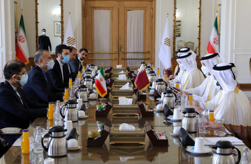  Iran's Foreign Minister Hossein Amir Abdollahian meets with Qatari Deputy Prime Minister and Foreign Minister Mohammed bin Abdulrahman Al Thani, in Tehran, Iran, September 9, 2021. (photo credit: REUTERS)