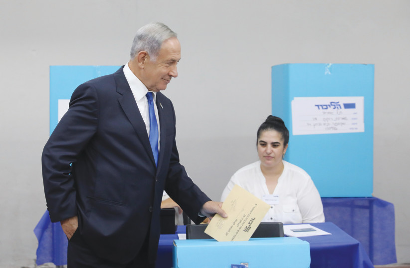 LIKUD CHAIRMAN and opposition leader Benjamin Netanyahu casts his ballot in the party primary, last week. (photo credit: MARC ISRAEL SELLEM/THE JERUSALEM POST)