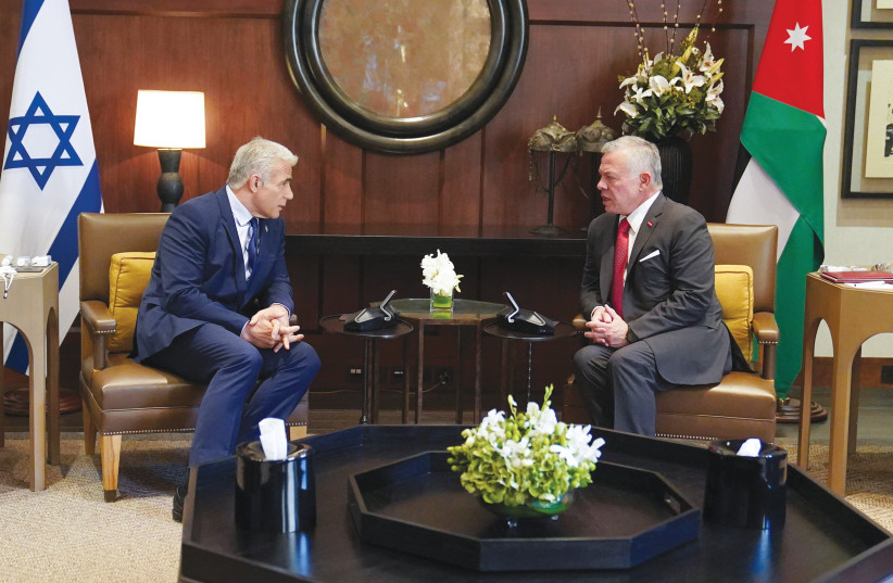 PRIME MINISTER Yair Lapid meets Jordan’s King Abdullah II in Amman, last month. (photo credit: JORDANIAN ROYAL PALACE/REUTERS)