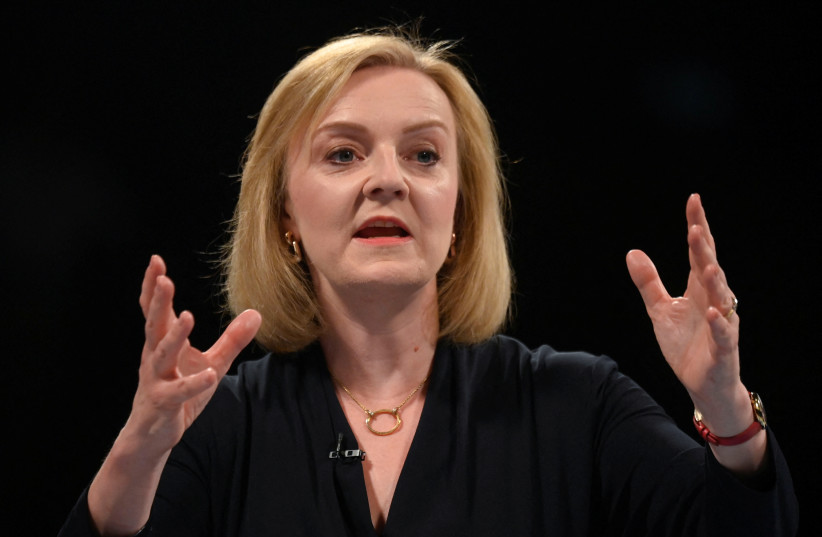 Britain's Conservative Party leadership candidate Liz Truss speaks during a hustings event, part of the Conservative party leadership campaign, in Cheltenham, Britain, August 11, 2022. (credit: REUTERS/TOBY MELVILLE)