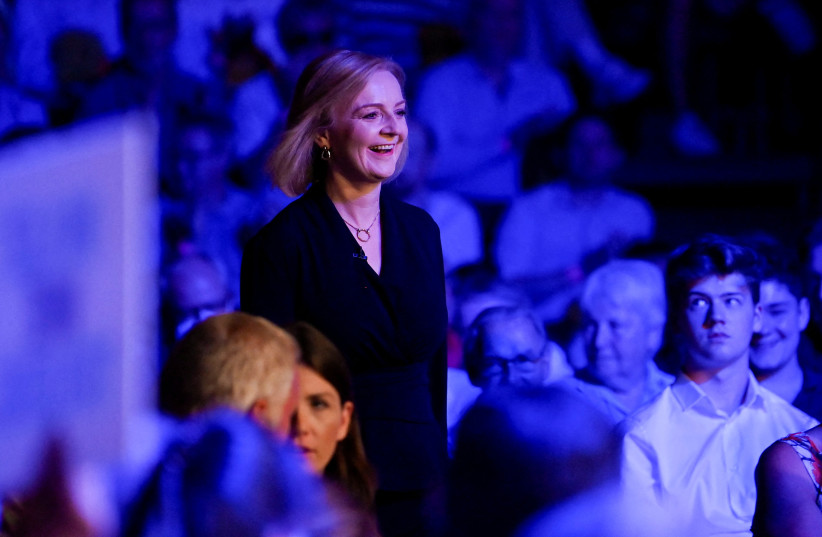 Britain's Conservative Party leadership candidate Liz Truss attends a hustings event, part of the Conservative party leadership campaign, in Cheltenham, Britain, August 11, 2022. (credit: REUTERS/TOBY MELVILLE)