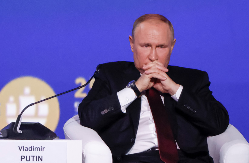 Russian President Vladimir Putin attends a session of the St. Petersburg International Economic Forum (SPIEF) in Saint Petersburg, Russia (photo credit: MAXIM SHEMETOV/REUTERS)