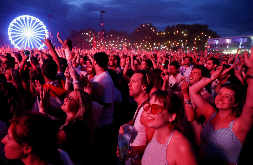  Festivalgoers attend the Sziget music festival on an island in the Danube River in Budapest, Hungary, August 11, 2022. (photo credit: REUTERS/BERNADETT SZABO)