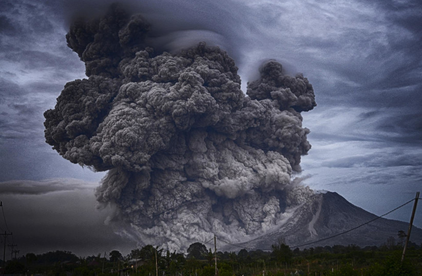  Ash is seen being spewed in a volcanic eruption (Illustrative). (credit: PIXABAY)
