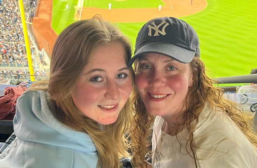  Dalya Pickholtz and her mother, Tammy, at a Yankee's game.  (credit: TOVAH LAZAROFF)