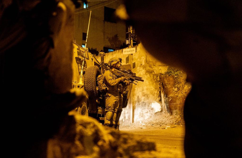   IDF arresting suspects in the West Bank.  (photo credit: IDF SPOKESPERSON'S UNIT)