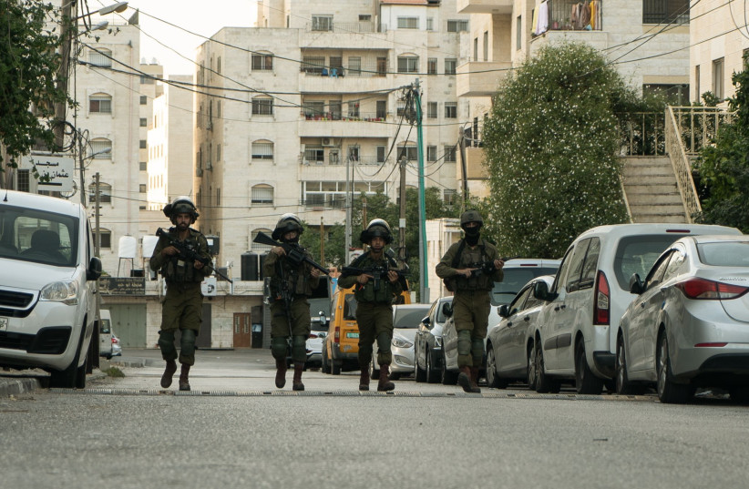  IDF arresting suspects in the West Bank.  (photo credit: IDF SPOKESPERSON'S UNIT)