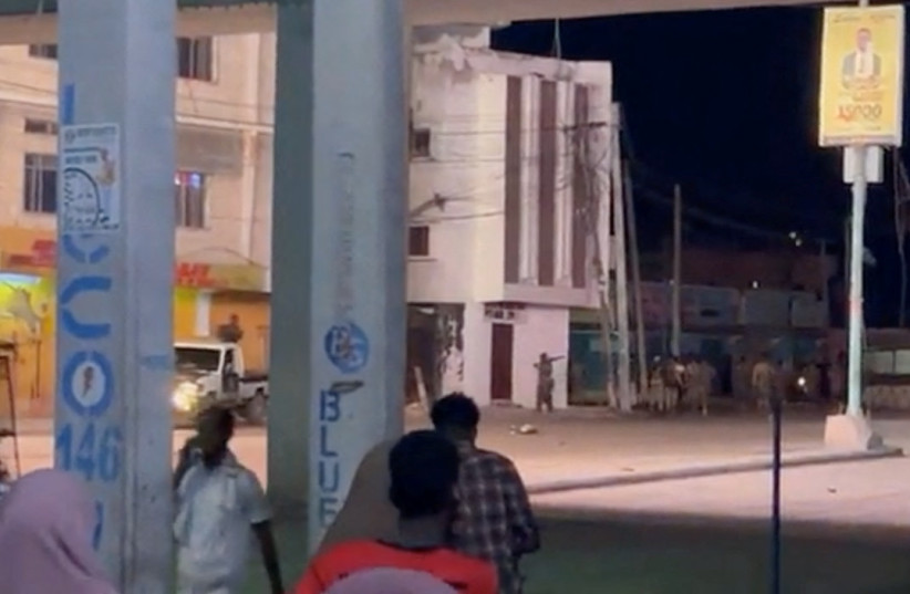  Members of the security forces take position after, according to police and intelligence officers, unidentified armed attackers took control of a hotel, in Mogadishu, Somalia, August 19, 2022 in this screen grab from a video obtained from social media. (credit: Abdalle Ahmed Mumin/via REUTERS)