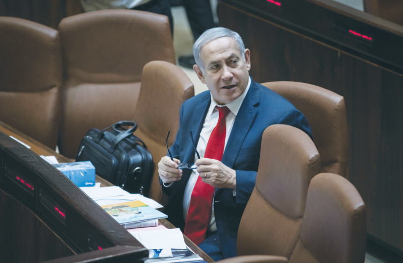  THEN-PRIME MINISTER Benjamin Netanyahu attends the Knesset plenum session ahead of the vote on the Basic Law: Israel as the Nation-State of the Jewish People, 2018 (credit: HADAS PARUSH/FLASH90)