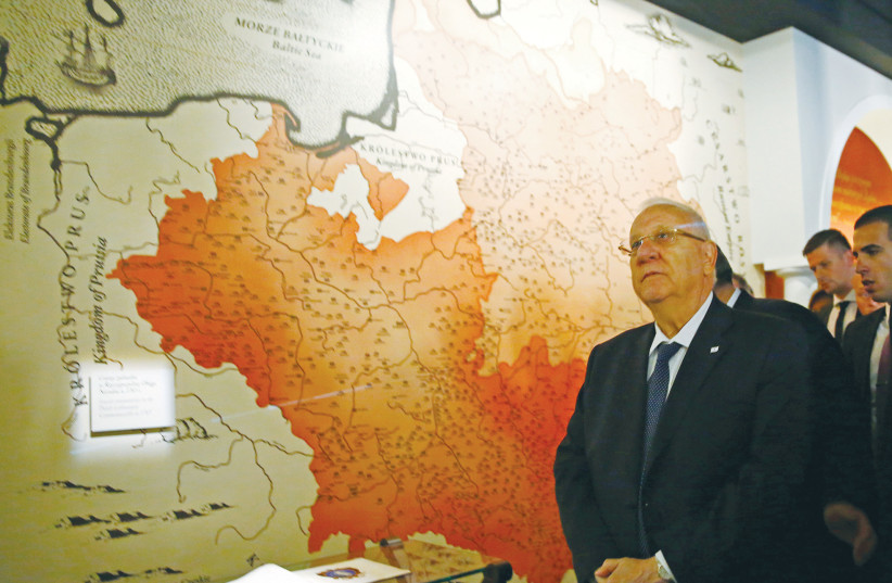  THEN-PRESIDENT Reuven Rivlin visits the Museum of the History of Polish Jews in Warsaw, 2014, when it was newly built (photo credit: REUTERS)
