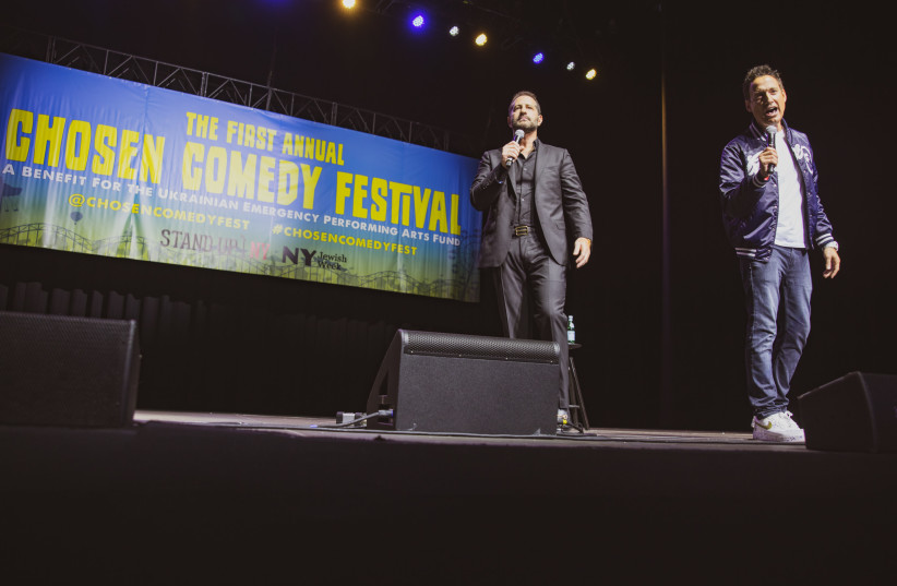Comedians Modi, left, and Elon Gold onstage at the Chosen Comedy Festival, Coney Island, NYC, Aug. 16, 2022. (photo credit: MIKE MONTI)
