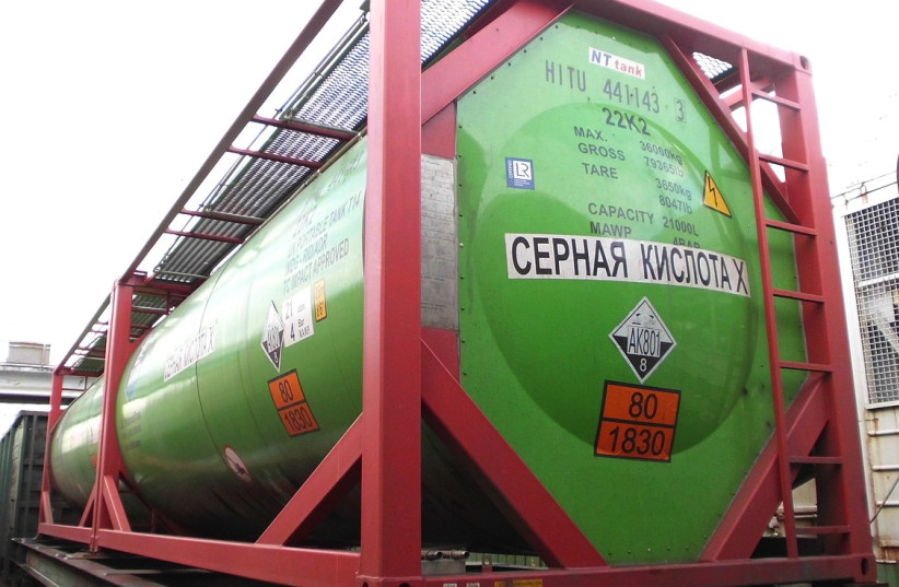  Tank containers with sulfuric acid on a fitting railway platform. (photo credit: Wikimedia Commons)