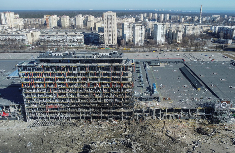 General view shows the site of a bombing at a shopping center, as Russia's invasion of Ukraine continues, in Kyiv, Ukraine March 21, 2022. (credit: REUTERS/MARKO DJURICA)
