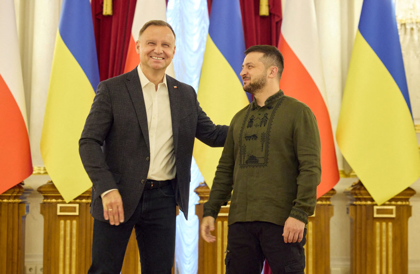 Ukraine’s President Volodymyr Zelensky and Poland's President Andrzej Duda pose for a picture before a meeting, amid Russia's attack on Ukraine, in Kyiv, Ukraine August 23, 2022. (credit: Ukrainian Presidential Press Service/Handout via REUTERS)