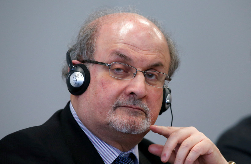  Author Salman Rushdie listens during the opening news conference of the Frankfurt book fair, Germany October 13, 2015. (credit: REUTERS/RALPH ORLOWSKI)