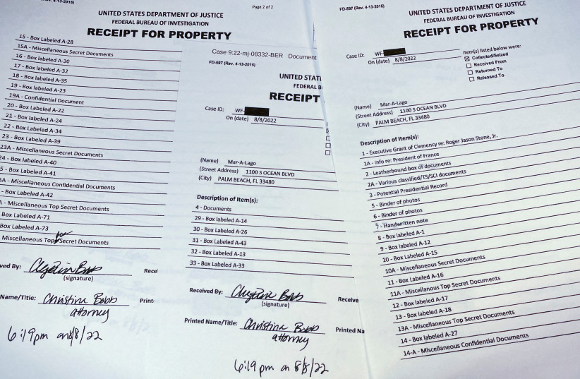 The three page itemized list of property seized in the execution of a search warrant by the FBI at former President Donald Trump's Mar-a-Lago estate is seen after being released by the US District Court for the Southern District of Florida in West Palm Beach, Florida, US August 12, 2022. (credit: REUTERS/JIM BOURG/FILE PHOTO)