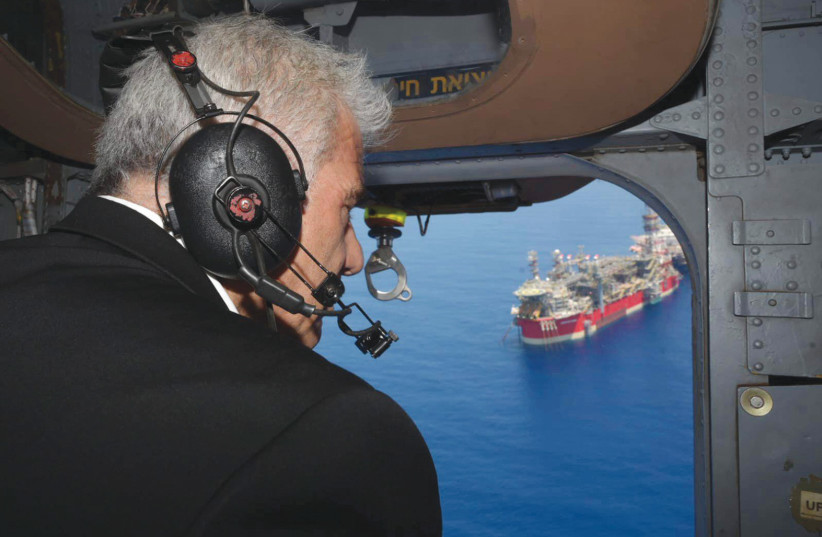  Prime Minister Yair Lapid flies over the Karish gas rig. (credit: AMOS BEN-GERSHOM/GPO)