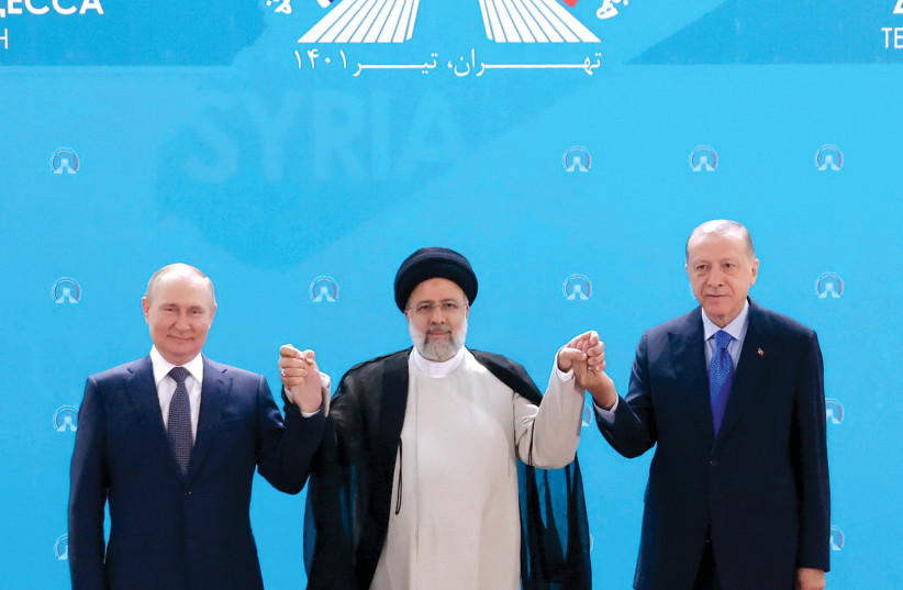  Russian President Vladimir Putin, Iranian President Ebrahim Raisi and Turkish President Tayyip Erdogan pose for a photo on July 19 before a Tehran meeting of leaders from the three guarantor states of the Astana process, designed to find a peace settlement in Syria. (photo credit: WANA/REUTERS)