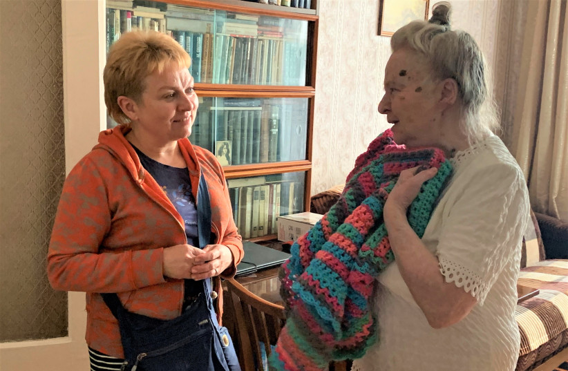  ALINA (L) visits Isabella in her Mariupol home during peaceful times before the Ukraine war.  (photo credit: Christians for Israel)