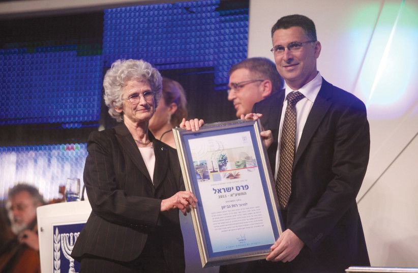  LAW PROFESSOR Ruth Gavison receives the Israel Prize from then-education minister Gideon Sa’ar, in Jerusalem, 2011 (photo credit: LIOR MIZRAHI/FLASH90)
