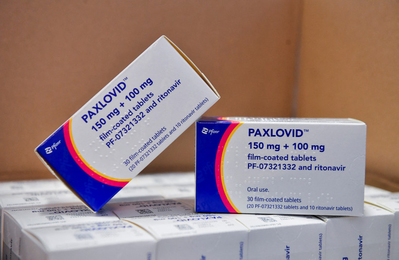  Coronavirus disease (COVID-19) treatment pill Paxlovid is seen in boxes, at Misericordia hospital in Grosseto, Italy, February 8, 2022.  (photo credit: REUTERS/ JENNIFER LORENZINI)