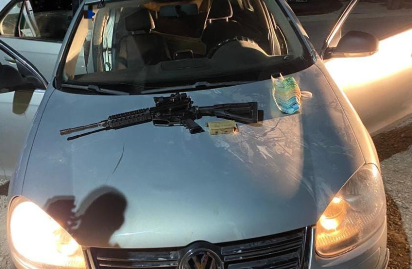  Israeli security forces seized an illegally acquired M16 and ammunition during an operation in the West Bank overnight, August 28, 2022. (photo credit: ISRAEL POLICE SPOKESPERSON'S UNIT)