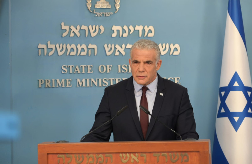  Prime Minister Yair Lapid at a briefing, August 28, 2022.  (photo credit: AMOS BEN GERSHOM/GPO)