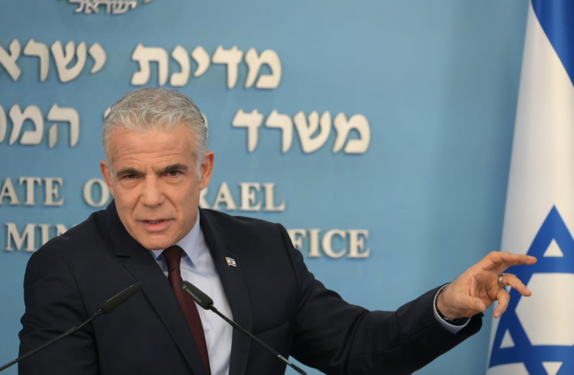   Prime Minister Yair Lapid at a briefing, August 28, 2022.  (credit: AMOS BEN-GERSHOM/GPO)