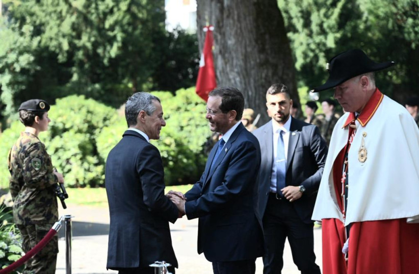  President Isaac Herzog meets with Swiss President Ignazio Cassis as they commemorate the 125th anniversary of the First Zionist Congress in Basel. (photo credit: HAIM ZACH/GPO)