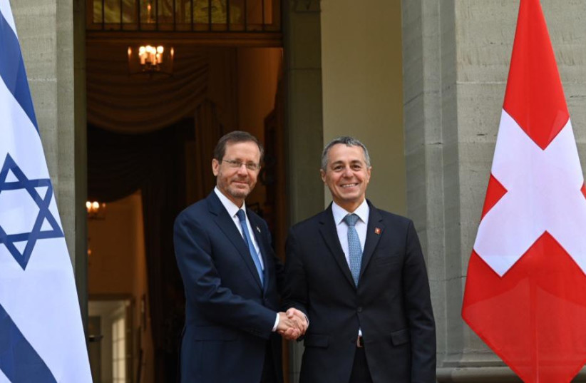  President Isaac Herzog meets with Swiss President Ignazio Cassis as they commemorate the 125th anniversary of the First Zionist Congress in Basel. (credit: HAIM ZACH/GPO)