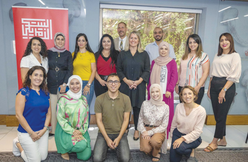  SENIOR OFFICER Liz Allen meets alumni of the Office of Palestinian Affairs education and professional exchange programs in Jerusalem (photo credit: US OFFICE OF PALESTINIAN AFFAIRS/FACEBOOK)