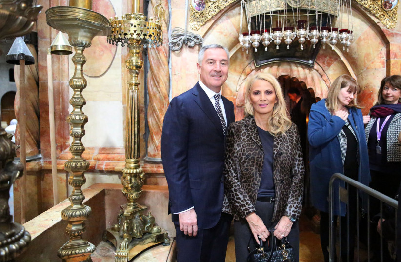  President of Montenegro Milo Đukanović and his wife Lidija Kuč visit the Church of the Holy Sepulchre in Jerusalem. (credit: PRESIDENT OF MONTENEGRO)