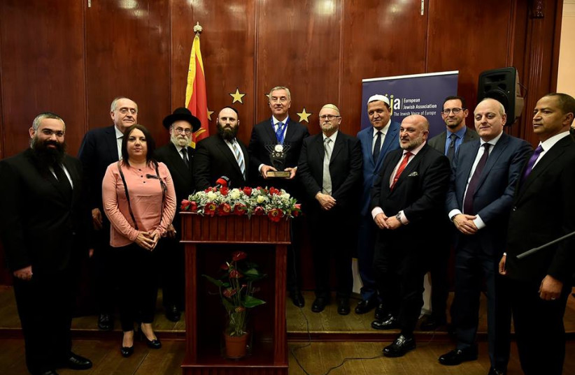  The European Jewish Association presents President of Montenegro Milo Đukanović with the European King David Award, Brussels, Belgium, March 6, 2019. (credit: PRESIDENT OF MONTENEGRO)