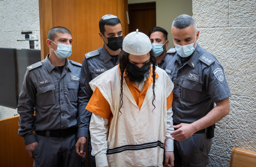  Amiram Ben Uliel, accused of the Duma arson murder in July 2015 where three members of the Dawabshe family were killed, arrives to a court hearing on his appeal, at the Supreme Court in Jerusalem, on March 7, 2022.  (credit: YONATAN SINDEL/FLASH90)