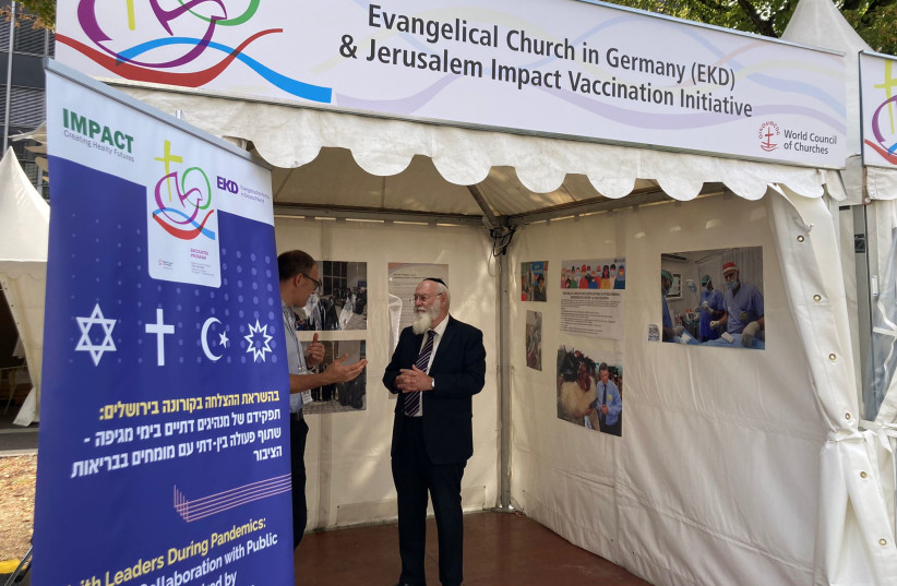  Prof. Avraham Steinberg in booth at conference in Germany. (photo credit: J. MECHECKA)