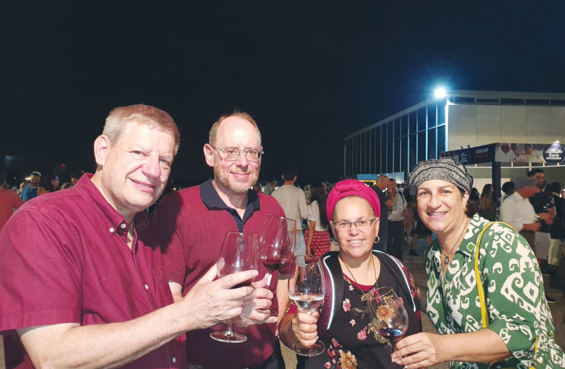  THE WRITER and his wife, Bonnie (center), with friends, attend this week’s Israel Museum Wine Festival. (photo credit: David M. Weinberg)