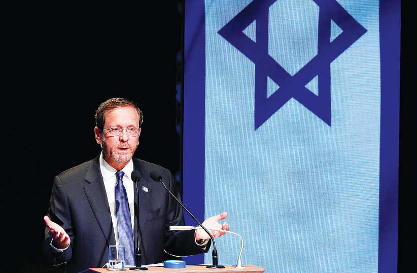  PRESIDENT ISAAC Herzog addresses the gathering in Basel this week.   (credit: ARND WIEGMANN / REUTERS)
