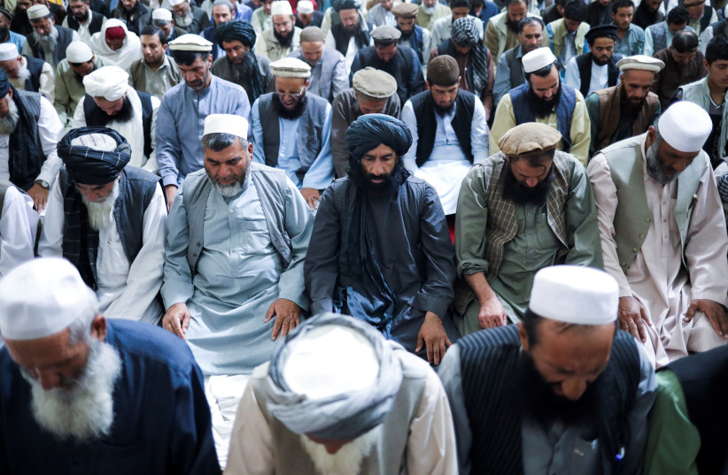  Afghan men pray in a mosque in Kabul, Afghanistan, September 17, 2021.  (photo credit: WANA (WEST ASIA NEWS AGENCY) VIA REUTERS)