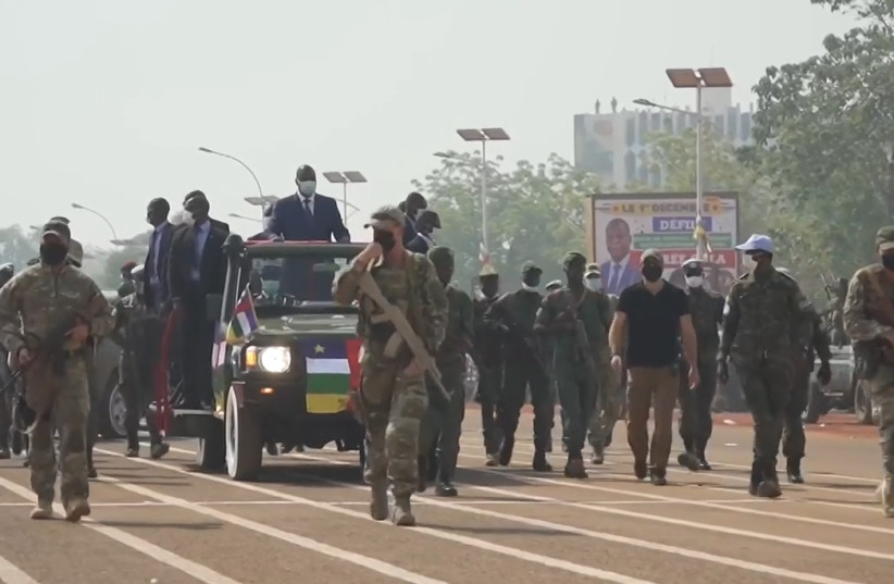 Russian mercenaries provide security for convoy with president of the Central African Republic (photo credit: CLÉMENT DI ROMA/VOA/PUBLIC DOMAIN/VIA WIKIMEDIA COMMONS)