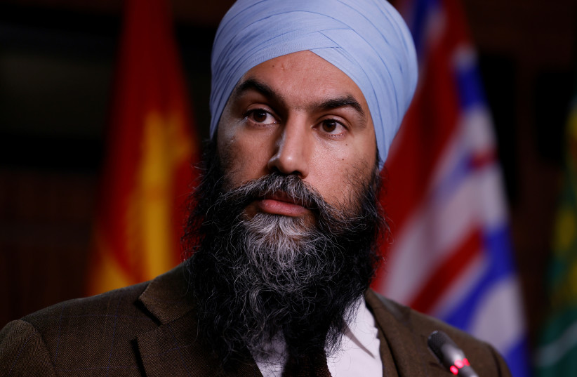  Canada's New Democratic Party leader Jagmeet Singh speaks at a news conference on Parliament Hill in Ottawa, Ontario, Canada December 8, 2021. (credit: REUTERS/BLAIR GABLE)