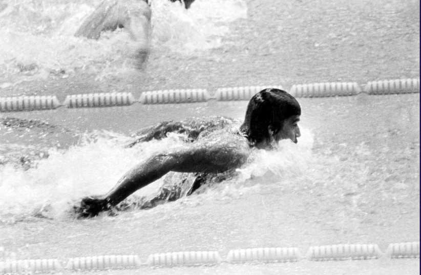 Mark Spitz in action at the 1972 Olympic Games in Munich, West Germany (photo credit: VIA REUTERS)