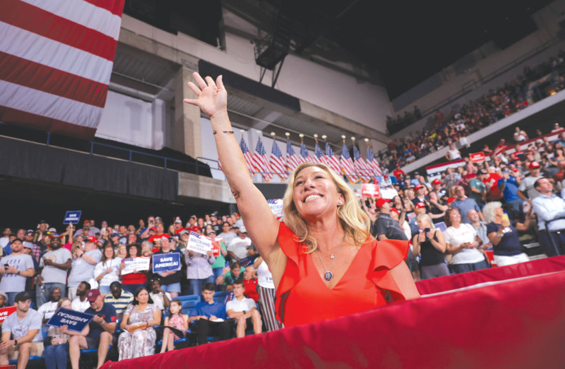  US REPRESENTATIVE Marjorie Taylor Greene waves to the crowd at a rally for former president Donald Trump in Pennsylvania on Saturday (photo credit: ANDREW KELLY / REUTERS)