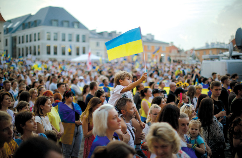  A demonstration in Warsaw on August 24 marks Ukraine’s Independence Day, as Russia’s invasion of Ukraine continues. (photo credit: Dawid Zuchowicz/Agencja Wyborcza/Reuters)
