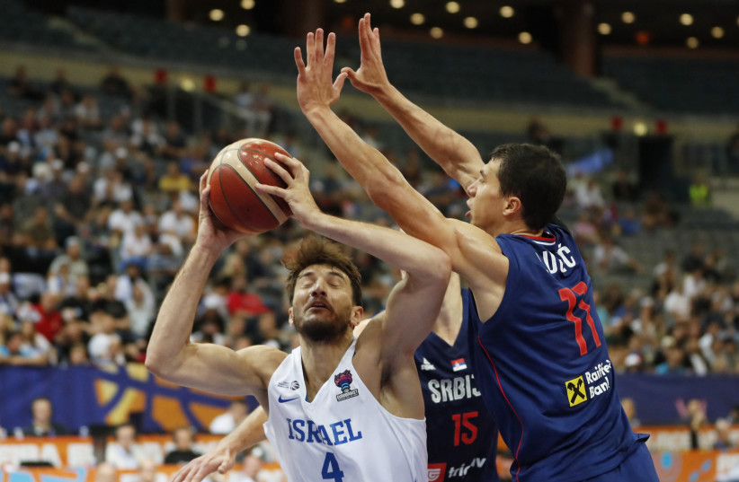   ROMAN SORKIN (left) and Israel were dealt an 11-point loss to Serbia at the Eurobasket, with the blue-and-white needing to beat the Czech Republic tonight.  (photo credit: DAVID W. CERNY / REUTERS)