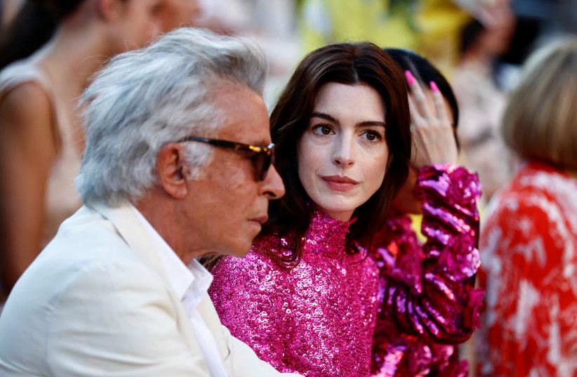  Anne Hathaway and Giancarlo Giammetti attend Valentino's "The Beginning" Fall-Winter 2022/2023 Haute Couture collection show on the Spanish Steps in the historic center of Rome, Italy July 8, 2022 (photo credit: REUTERS/YARA NARDI)