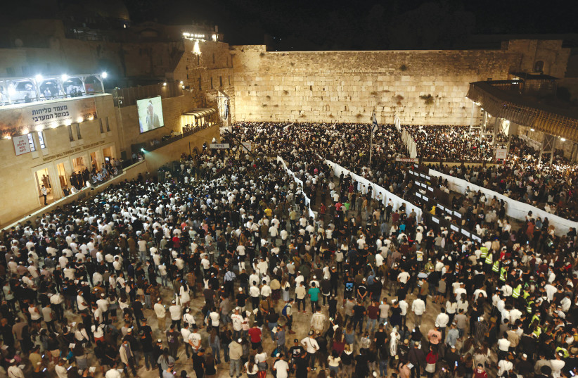  SLIHOT IN 2021. After two years of limited attendance due to the pandemic, Western Wall organizers are expecting huge crowds every night for the penitential prayer service.  (credit: RONEN ZVULUN/REUTERS)