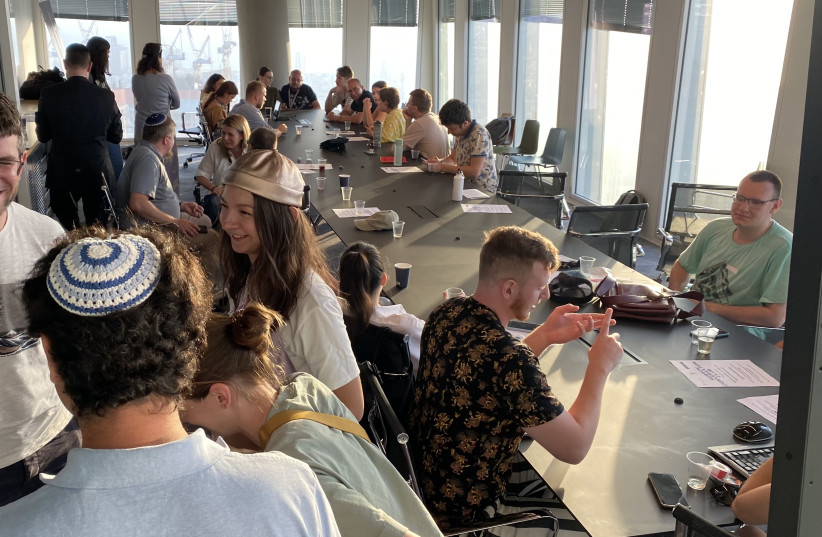  THE REBOOT’S Hebrew Conversation Club, a free professional meetup for displaced professionals and olim in partnership with Pearl Cohen and Yad L’Olim, in July. (photo credit: Sophia Tupolev-Luz)
