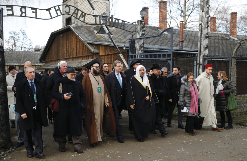  MOHAMMAD AL-ISSA, secretary-general of the Muslim World League, and David Harris, CEO of the American Jewish Committee, visit the former Nazi concentration and extermination camp Auschwitz I in Oswiecim, Poland, January 23, 2020. (credit: KACPER PEMPEL/REUTERS)