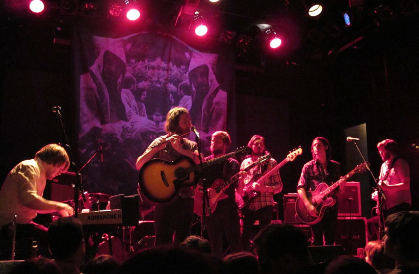  Midlake at the Bowery Ballroom in New York, with the album cover of The Courage of Others in the background. (credit: Wikimedia Commons)